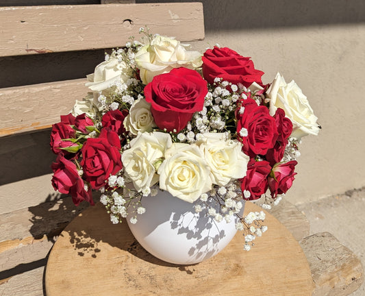Red and white roses pot arrangement
