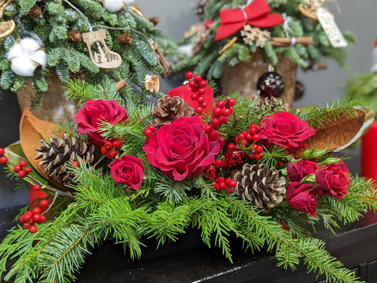 Traditional Christmas centerpiece with candle