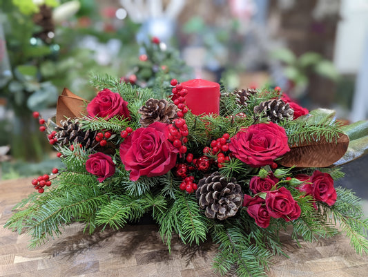 Traditional Christmas centerpiece with candle